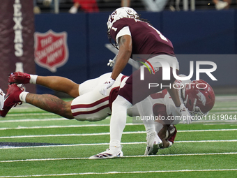 Arkansas Razorbacks running back Ja'Quinden Jackson #22 catches the ball against Texas A&M Aggies during the Southwest Classic match between...