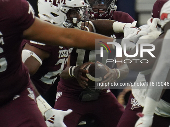 Texas A&M Aggies quarterback Marcel Reed #10 looks to pass the ball against the Arkansas Razorbacks during the Southwest Classic match betwe...