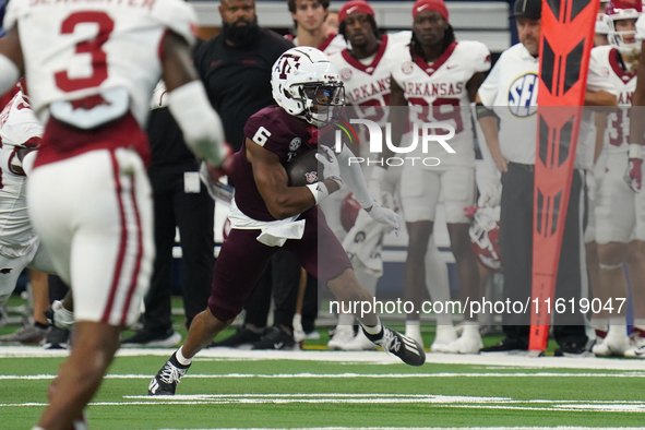 Texas A&M Aggies wide receiver Cyrus Allen #6 catches the ball against the Arkansas Razorbacks during the Southwest Classic match between th...