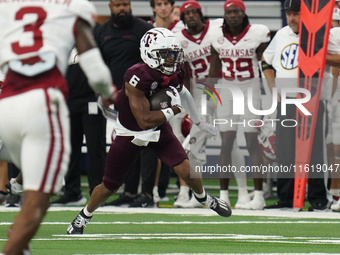 Texas A&M Aggies wide receiver Cyrus Allen #6 catches the ball against the Arkansas Razorbacks during the Southwest Classic match between th...