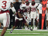 Texas A&M Aggies wide receiver Cyrus Allen #6 catches the ball against the Arkansas Razorbacks during the Southwest Classic match between th...