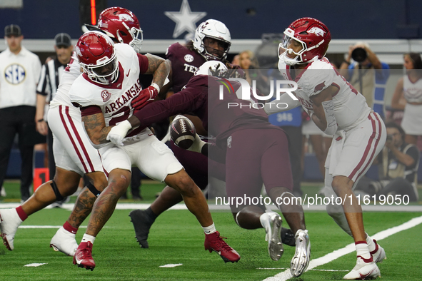 Texas A&M Aggies wide receiver Micah Tease #4 catches the ball against the Arkansas Razorbacks during the Southwest Classic match between th...