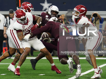 Texas A&M Aggies wide receiver Micah Tease #4 catches the ball against the Arkansas Razorbacks during the Southwest Classic match between th...