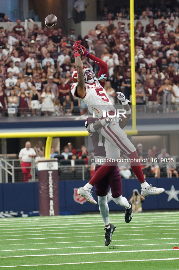 Arkansas Razorbacks wide receiver Tyrone Broden #5 fails to catch against Texas A&M Aggies during the Southwest Classic match between the Ar...