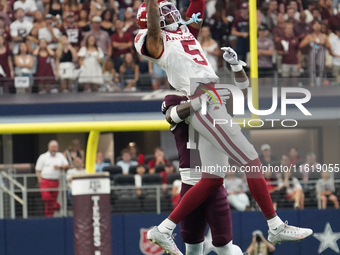 Arkansas Razorbacks wide receiver Tyrone Broden #5 fails to catch against Texas A&M Aggies during the Southwest Classic match between the Ar...