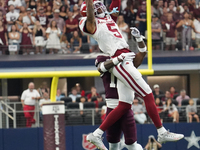 Arkansas Razorbacks wide receiver Tyrone Broden #5 fails to catch against Texas A&M Aggies during the Southwest Classic match between the Ar...