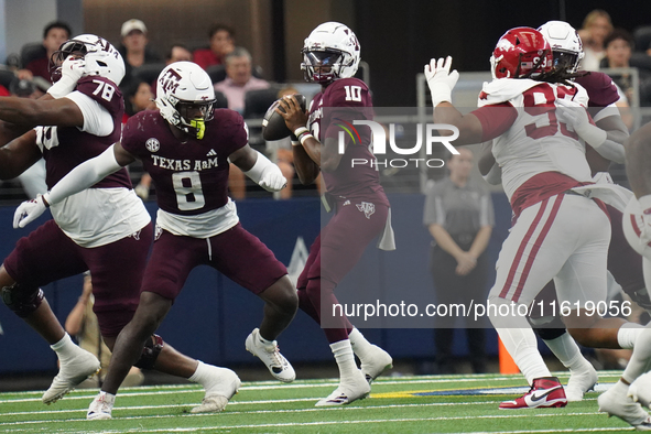 Texas A&M Aggies quarterback Marcel Reed #10 looks to throw a pass against the Arkansas Razorbacks during the Southwest Classic match betwee...