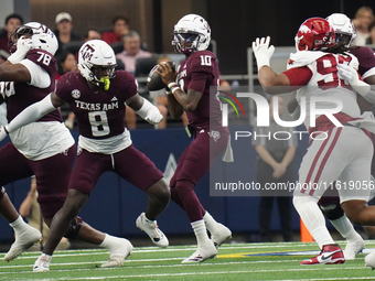 Texas A&M Aggies quarterback Marcel Reed #10 looks to throw a pass against the Arkansas Razorbacks during the Southwest Classic match betwee...