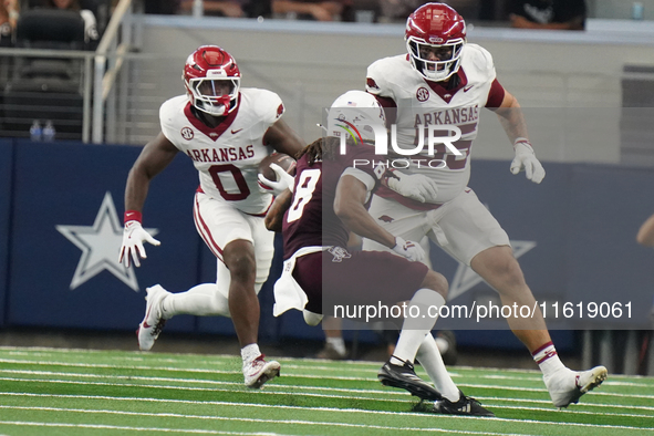 Texas A&M Aggies running back Le'Veon Moss #8 runs the ball after a reception against the Arkansas Razorbacks during the Southwest Classic m...