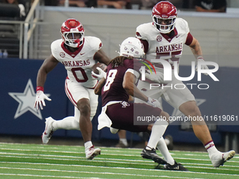 Texas A&M Aggies running back Le'Veon Moss #8 runs the ball after a reception against the Arkansas Razorbacks during the Southwest Classic m...