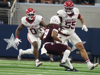 Texas A&M Aggies running back Le'Veon Moss #8 runs the ball after a reception against the Arkansas Razorbacks during the Southwest Classic m...