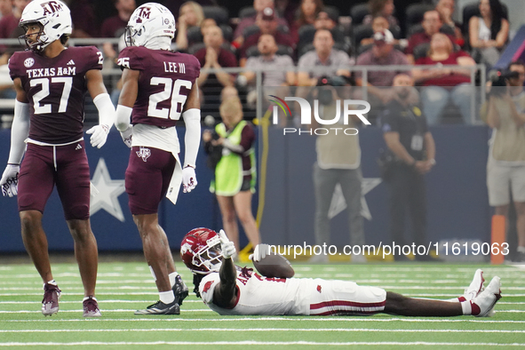 Arkansas Razorbacks wide receiver Andrew Armstrong #2 celebrates on the field after catching the ball against the Texas A&M Aggies during th...