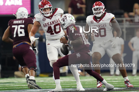 Texas A&M Aggies quarterback Marcel Reed #10 looks to throw a pass against the Arkansas Razorbacks during the Southwest Classic match betwee...