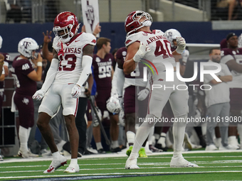 Arkansas Razorbacks defensive lineman Landon Jackson (#40) celebrates his tackle against Texas A&M Aggies quarterback Marcel Reed (#10) duri...