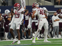 Arkansas Razorbacks defensive lineman Landon Jackson (#40) celebrates his tackle against Texas A&M Aggies quarterback Marcel Reed (#10) duri...