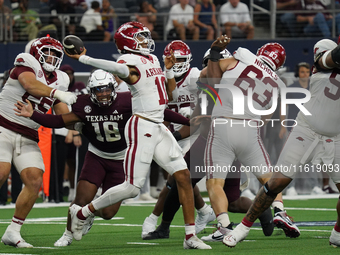 Arkansas Razorbacks quarterback Taylen Green #10 passes the ball against Texas A&M Aggies during the Southwest Classic match between the Ark...