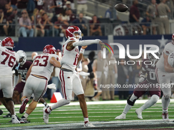 Arkansas Razorbacks quarterback Taylen Green #10 passes the ball against Texas A&M Aggies during the Southwest Classic match between the Ark...