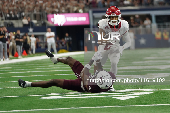 Arkansas Razorbacks Wide Receiver Isaiah Sategna #6 catches the ball against Texas A&M Razorbacks during the Southwest Classic match between...