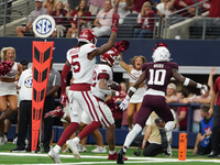 Arkansas Razorbacks running back Ja'Quinden Jackson #22 breaks into the secondary on his way to score a touchdown against the Texas A&M Aggi...