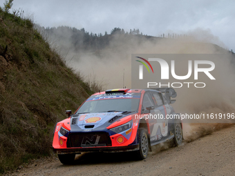 Driver Thierry Neuville and co-driver Martijn Wydaeghe of the Hyundai Shell Mobis World Rally Team, in a Hyundai i20 N Rally1 Hybrid, face t...