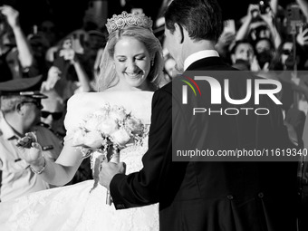 Princess Theodora Glucksburg of Greece and her brother Pavlos, former Crown Prince of Greece, arrive for her wedding with Matthew Jeremiah K...