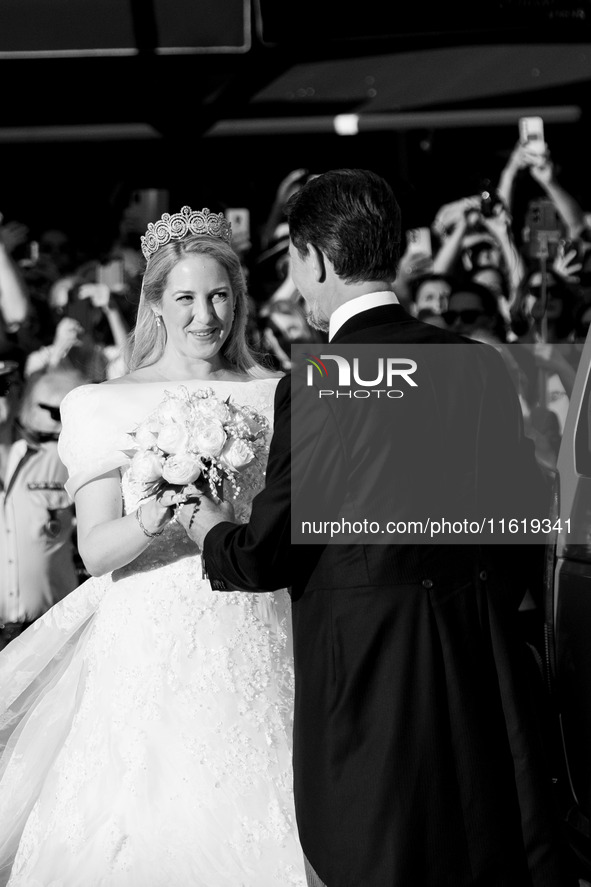 Princess Theodora Glucksburg of Greece and her brother Pavlos, former Crown Prince of Greece, arrive for her wedding with Matthew Jeremiah K...