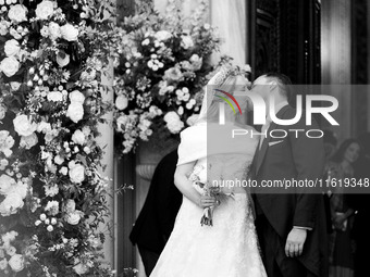 Princess Theodora Glucksburg of Greece and Matthew Jeremiah Kumar kiss each other after their wedding at the Metropolitan Cathedral in Athen...