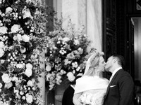 Princess Theodora Glucksburg of Greece and Matthew Jeremiah Kumar kiss each other after their wedding at the Metropolitan Cathedral in Athen...