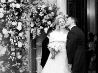 Matthew Jeremiah Kumar kisses Princess Theodora Glucksburg of Greece on her neck after their wedding at the Metropolitan Cathedral in Athens...