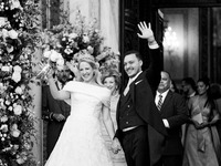 Princess Theodora Glucksburg of Greece and Matthew Jeremiah Kumar greet after their wedding at the Metropolitan Cathedral in Athens, Greece,...