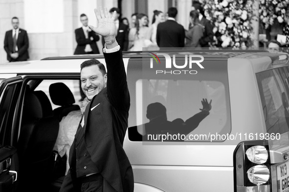 Matthew Jeremiah Kumar greets after his wedding with Princess Theodora Glucksburg at the Metropolitan Cathedral of Athens in Athens, Greece,...