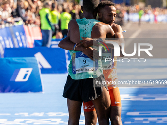 Milkesa Mengesha of Ethiopia wins the 50th Berlin Marathon in Berlin, Germany, on September 29, 2024, with a time of 2:03:17, followed by Cy...