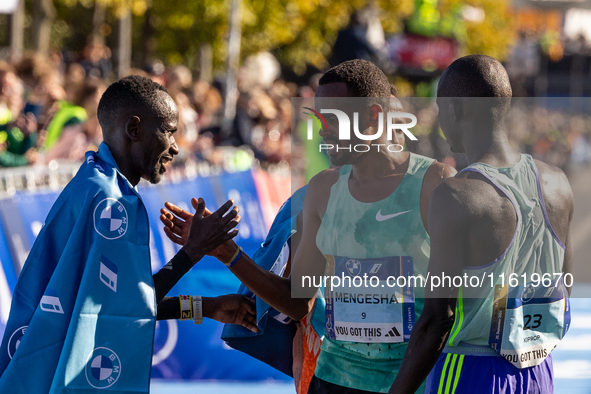 Milkesa Mengesha of Ethiopia wins the 50th Berlin Marathon in Berlin, Germany, on September 29, 2024, with a time of 2:03:17, followed by Cy...