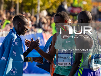 Milkesa Mengesha of Ethiopia wins the 50th Berlin Marathon in Berlin, Germany, on September 29, 2024, with a time of 2:03:17, followed by Cy...