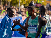 Milkesa Mengesha of Ethiopia wins the 50th Berlin Marathon in Berlin, Germany, on September 29, 2024, with a time of 2:03:17, followed by Cy...