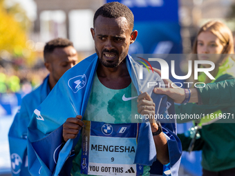 Milkesa Mengesha of Ethiopia wins the 50th Berlin Marathon in Berlin, Germany, on September 29, 2024, with a time of 2:03:17, followed by Cy...