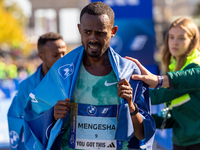 Milkesa Mengesha of Ethiopia wins the 50th Berlin Marathon in Berlin, Germany, on September 29, 2024, with a time of 2:03:17, followed by Cy...