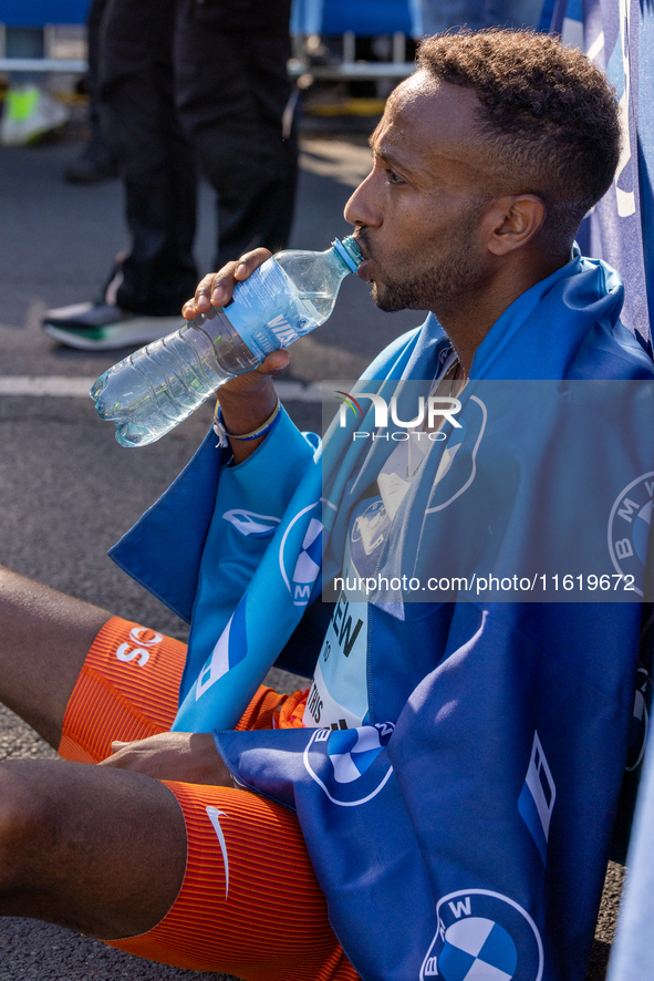 In Berlin, Germany, on September 29, 2024, Haymanot Alew of Ethiopia secures third place at the Berlin Marathon. Milkesa Mengesha of Ethiopi...