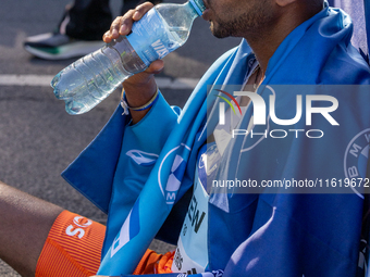 In Berlin, Germany, on September 29, 2024, Haymanot Alew of Ethiopia secures third place at the Berlin Marathon. Milkesa Mengesha of Ethiopi...