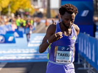 In Berlin, Germany, on September 29, 2024, Tadese Takele of Ethiopia finishes in 7th place at the Berlin Marathon. Milkesa Mengesha of Ethio...