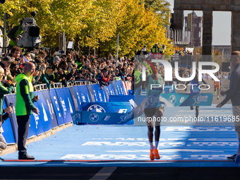 Milkesa Mengesha of Ethiopia wins the 50th Berlin Marathon in Berlin, Germany, on September 29, 2024, with a time of 2:03:17, followed by Cy...