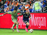 Cincinnati midfielder Luca Orellano moves the ball upfield during the Major League Soccer match between FC Cincinnati and Los Angeles FC at...