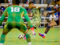 LAFC attacker Denis Bouanga shoots and scores a second-half goal during the Major League Soccer match between FC Cincinnati and Los Angeles...