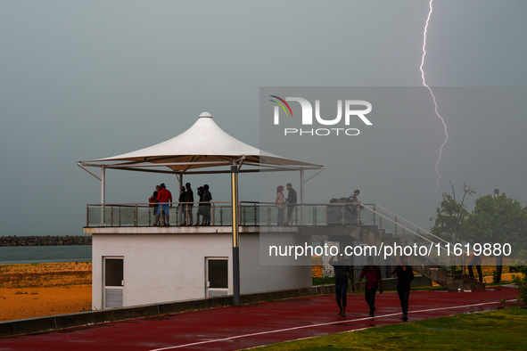 Lightning strikes the ground in Colombo, Sri Lanka, on September 29, 2024. 