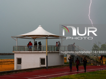 Lightning strikes the ground in Colombo, Sri Lanka, on September 29, 2024. (