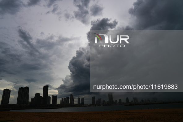 Dark clouds appear over the skyline in Colombo, Sri Lanka, on September 29, 2024. 