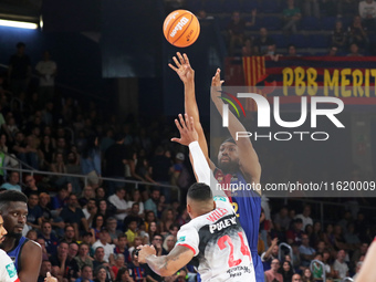 Jabari Parker and Jacob Wiley play during the match between FC Barcelona and Coviran Granada, corresponding to week 1 of the Liga Endesa, at...