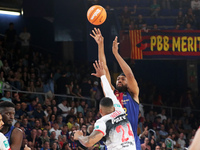 Jabari Parker and Jacob Wiley play during the match between FC Barcelona and Coviran Granada, corresponding to week 1 of the Liga Endesa, at...