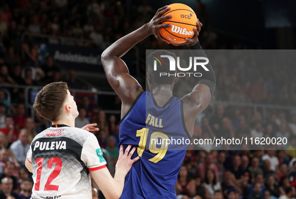 Youssoupha Fall and Agustin Ubal play during the match between FC Barcelona and Coviran Granada, corresponding to week 1 of the Liga Endesa,...