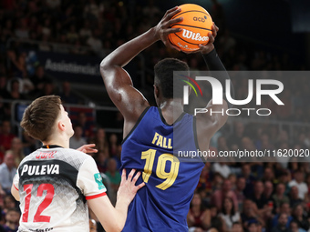 Youssoupha Fall and Agustin Ubal play during the match between FC Barcelona and Coviran Granada, corresponding to week 1 of the Liga Endesa,...